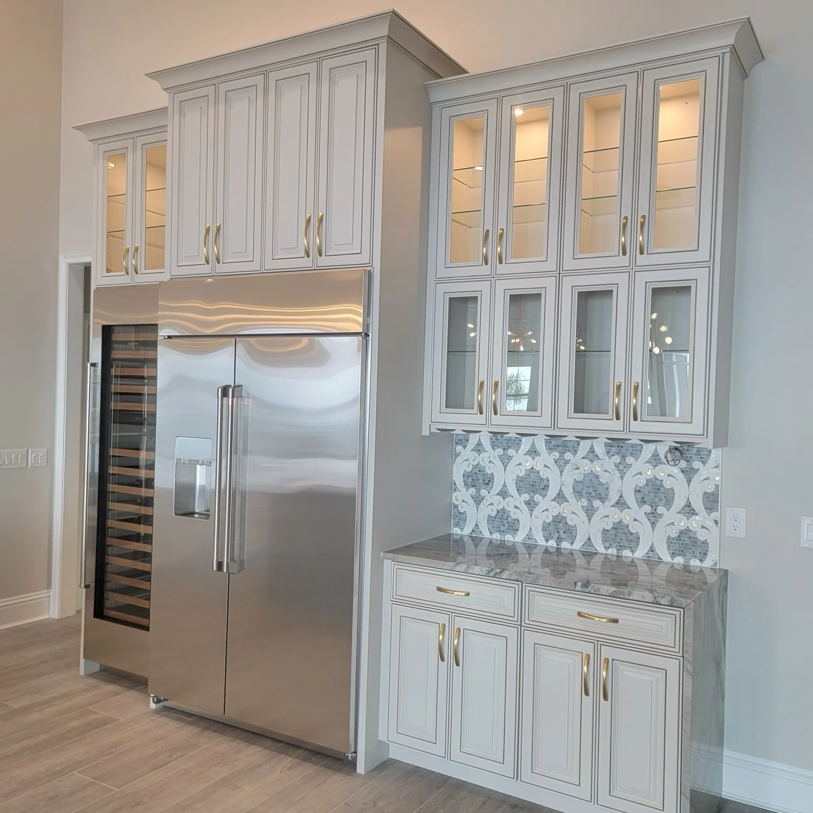 Reach-in closet and cabinetry with custom shelving